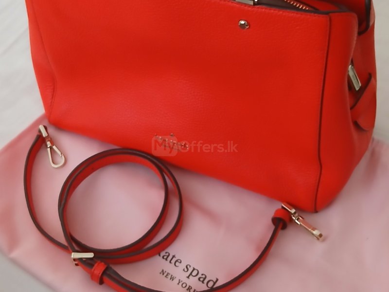 Preloved Kate Spade New York Leila Medium Triple Compartment Satchel in red pebbled leather.

Bare